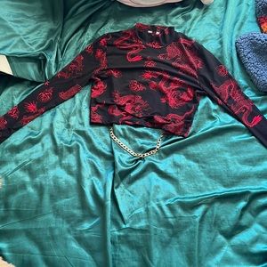 Red and black dragon cropped turtle neck.semi-backless with gold chain accessory